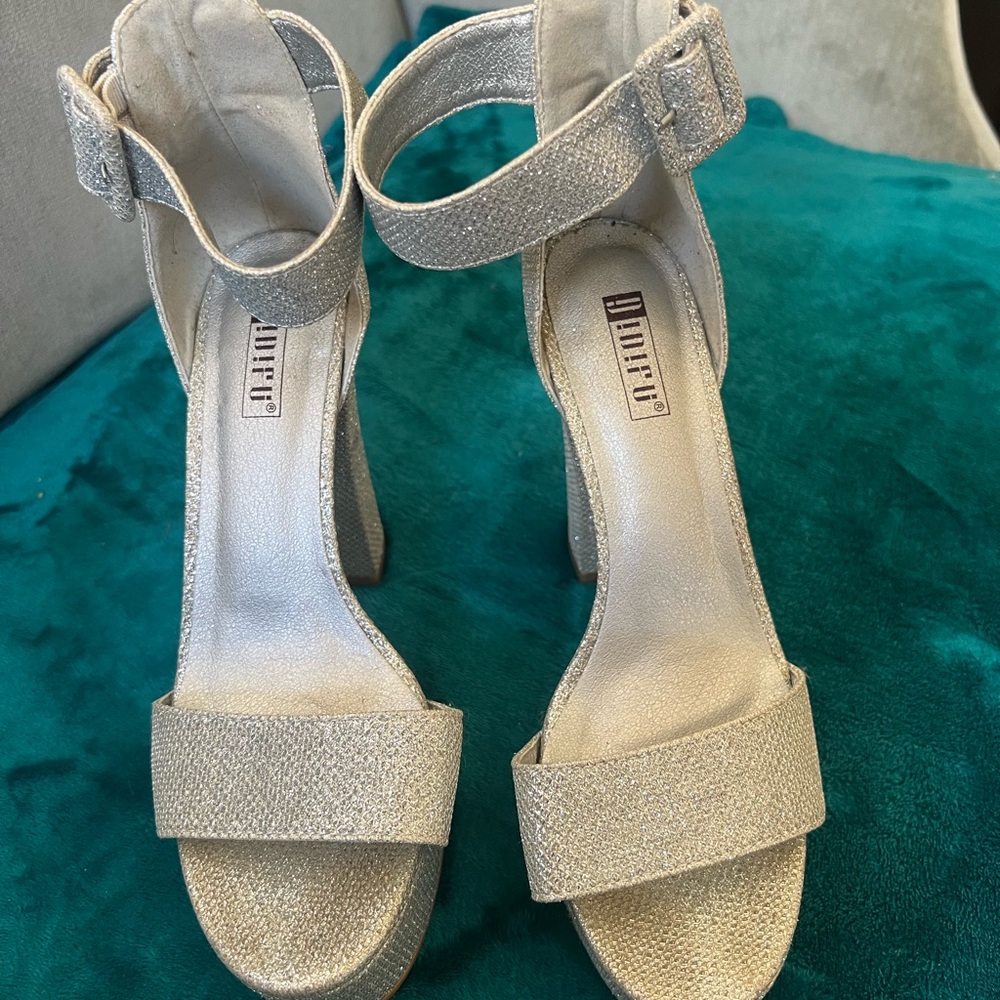 Idifu platform heels.  Silver glitter size 6.5.  Open toe, buckle around ankle.
